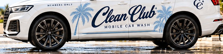 White SUV with Clean Club palm script wrap