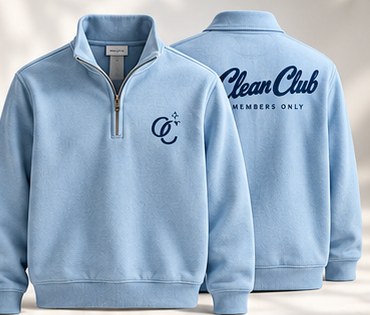 Powder blue quarter-zip with Clean Club script on the back